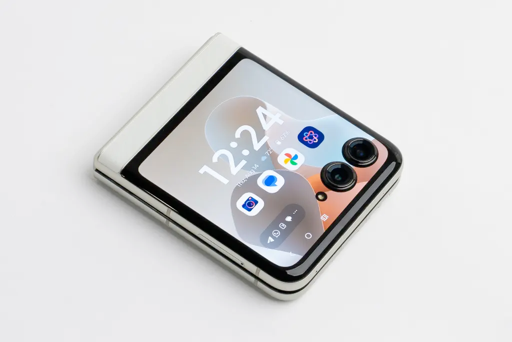 A phone screen displaying multiple low insurance rates compared side-by-side